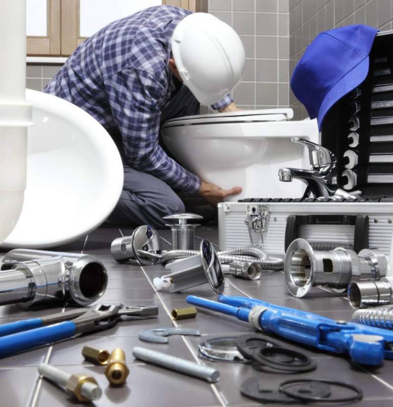 Professional plumber performing drain cleaning in San Mateo CA